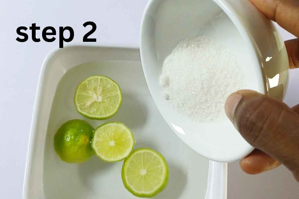 adding-sugar-to-fresh-homemade-lemonade-recipe
